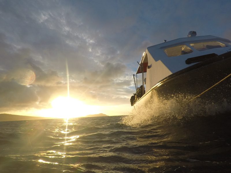 Reef Pirates' dive boat, The Hapa, on Oahu waters in Hawaii